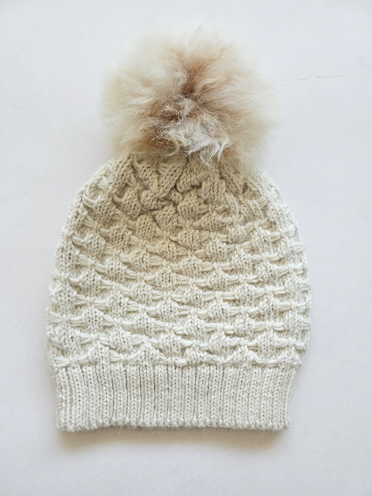 The Heritage Kids Beanie in 100% baby alpaca with an alpaca pom-pom
