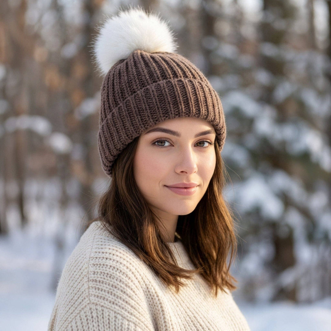 Channel knit beanie in 100% baby alpaca with a soft alpaca pom-pom top, brown and fawn