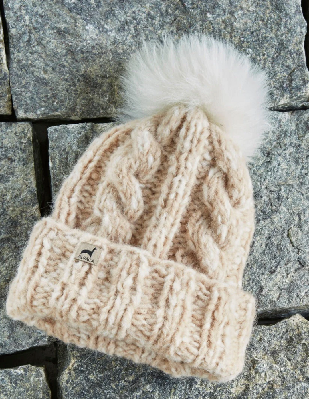 Marshmallow Trenza cable-knit alpaca hat with a fluffy baby alpaca pom-pom