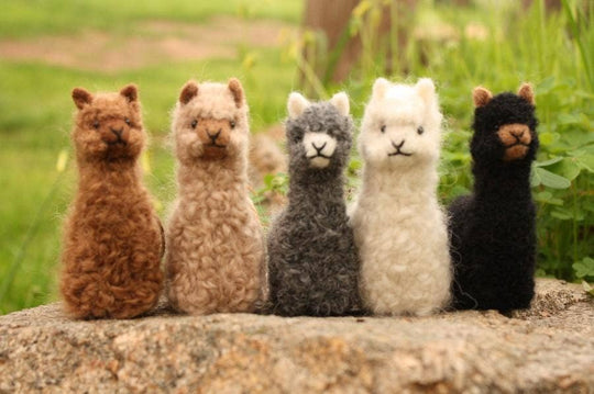 Alpacadorable ornament — a small alpaca hand-sculpted from 100% baby alpaca fibre, in natural grey, fawn and brown