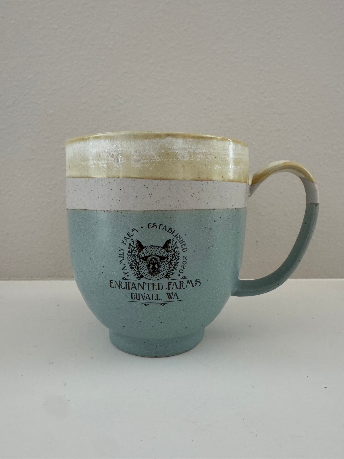 Enchanted Farms artifact 12 ounce mug, an alpaca farm souvenir