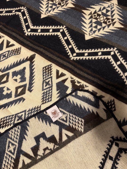 Detailed view of the geometric design of the Cuzco Stone Alpaca Wool Blanket highlighting craftsmanship and texture 