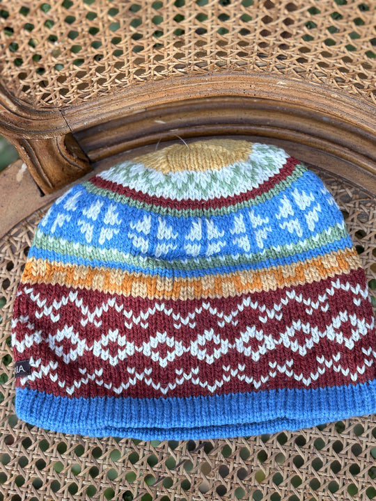 Harvest Sky fair isle hat in sky blue, gold and deep red