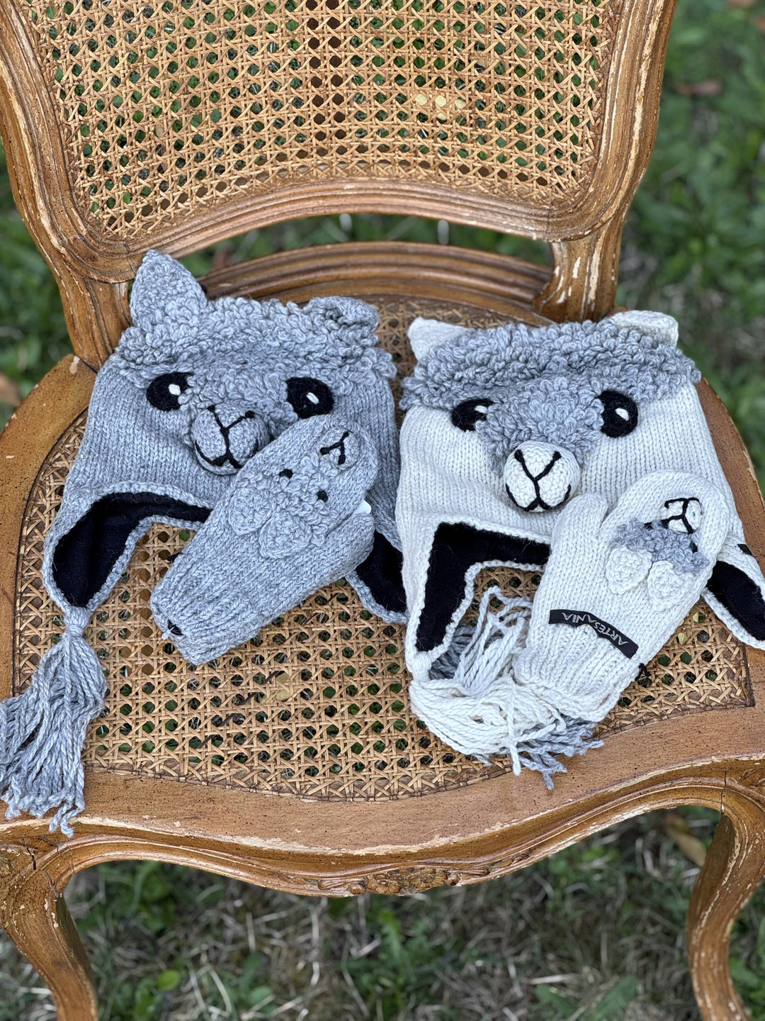 Kids alpaca face mittens shown with the matching hats (sold separately)