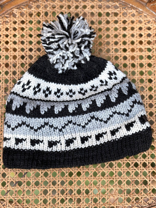 Kids fair isle pom beanie in black and gray