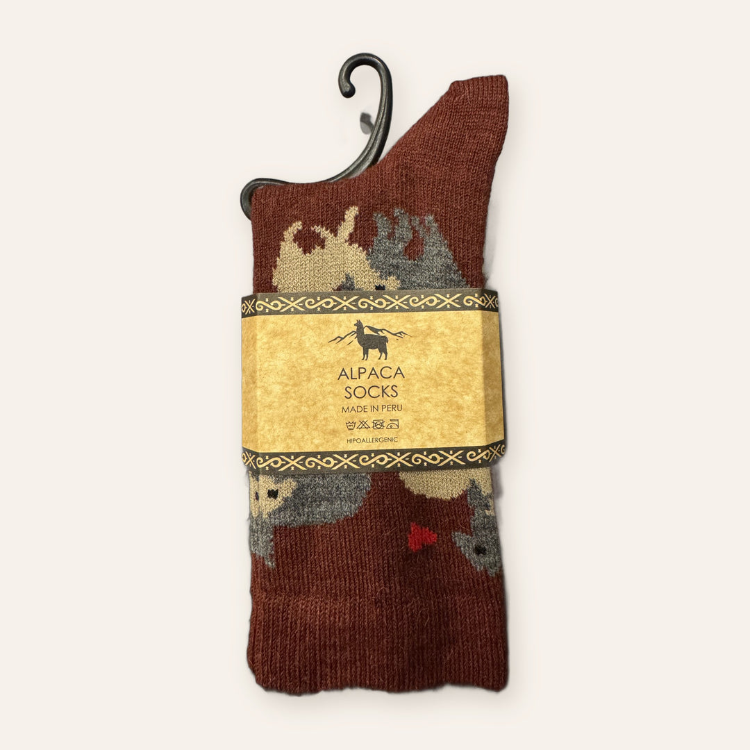 Brick red alpaca socks with alpaca faces and a red heart, made in Peru