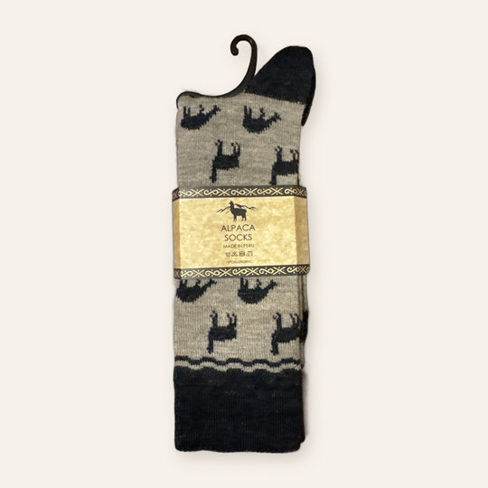 Taupe alpaca socks with black alpaca silhouettes and charcoal cuff, made in Peru